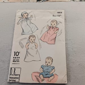 May include: Vintage baby doll dress pattern with illustrations of babies in various outfits. The pattern is labeled "1885B Size 11" and includes the price "10¢ each". The Du Barry Guaranteed Patterns logo is visible.