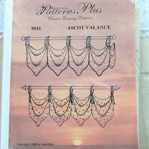 May include: A sewing pattern instruction booklet titled Patterns Plus Window Covering Patterns 5941 Ascot Valance. The cover features black line drawings of two valance styles on rods against a sunset background with copyright text.