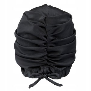 May include: Black satin swim cap with a gathered design and a tie at the back.