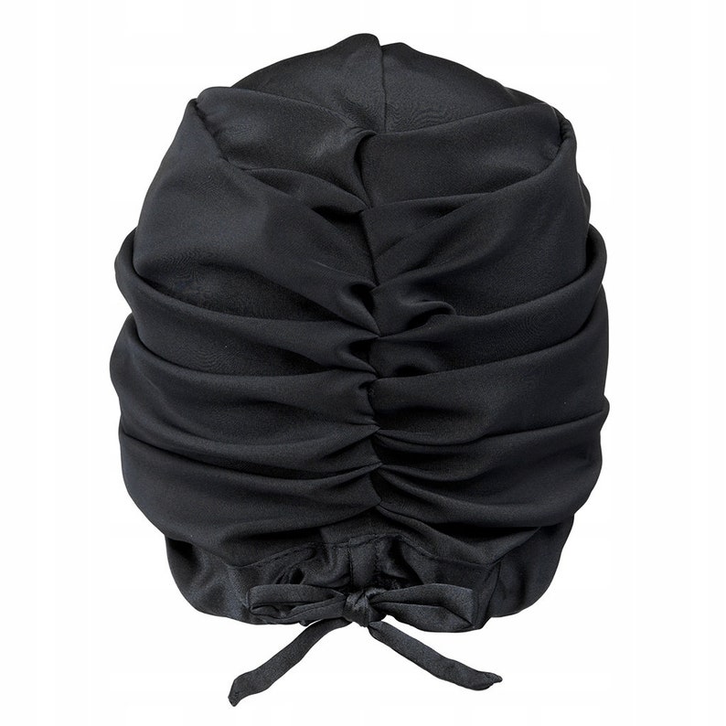 May include: Black satin swim cap with a gathered design and a tie at the back.