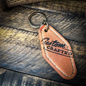 Guante de béisbol de cuero Motel Key Fob, llavero