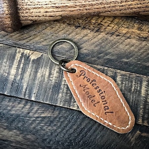 Guante de béisbol de cuero Motel Key Fob, llavero