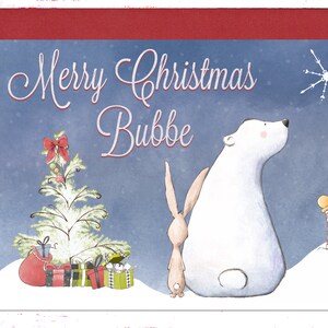 May include: A Christmas card with a blue background featuring a white polar bear, a brown bunny rabbit, and a white Christmas tree with red and green presents. The card says "Merry Christmas Bubbe" in white cursive lettering.
