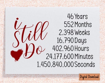 May include: A white card with the words "i still do" in red script, accompanied by a red heart. The card lists the duration of a relationship in years, months, weeks, days, hours, minutes, and seconds. The words "Digital Download" are in the bottom right corner.