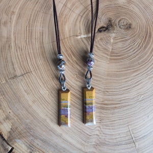 River Jasper pendant necklaces on leather cord