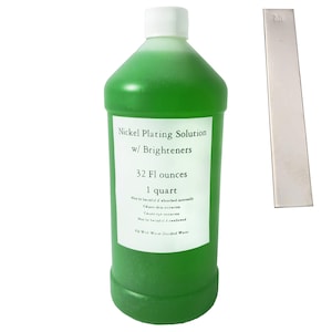 May include: A green liquid in a plastic bottle labeled "Nickel Plating Solution w/ Brighteners." The bottle contains 32 fluid ounces, equivalent to 1 quart. A small, rectangular metal strip with "Ni" printed on it is next to the bottle.