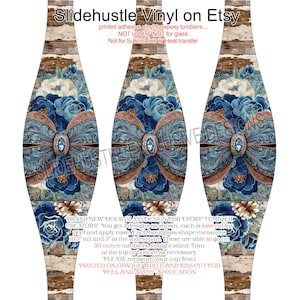 May include: Vinyl wrap for 30-ounce tumblers. The design features a blue floral arrangement with a brown bow and a central jewel. The background has a wood-like texture. Text on the wrap says "Slidehustle Vinyl on Etsy".