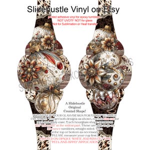 May include: Two hourglass-shaped vinyl decals for epoxy tumblers. Each features a detailed Christmas ornament design with floral accents, set against a wood grain background. The decals are 10.5 inches tall and 3 inches wide.