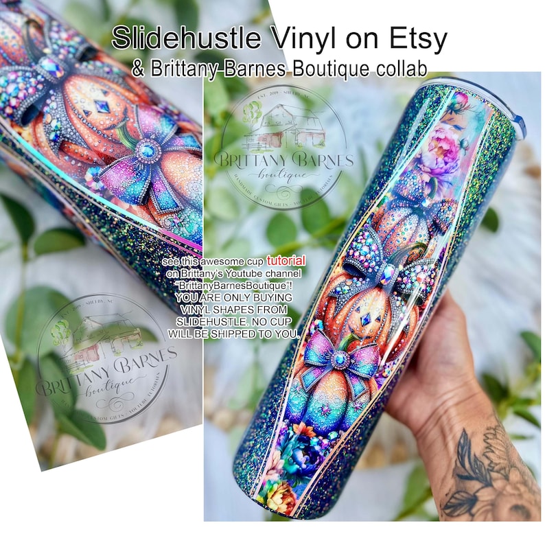 May include: A glittery tumbler with a colorful pumpkin design and bow accents. The text "Slidehustle Vinyl on Etsy & Brittany Barnes Boutique collab" is visible. The tumbler is decorated with floral and glitter details. The text "see this awesome cup tutorial on Brittany's Youtube channel" is also visible.