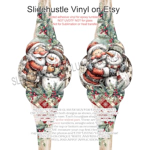 May include: Hourglass-shaped vinyl decal for epoxy tumblers featuring Santa Claus and a snowman. The design includes a festive red and green plaid pattern, with text that reads "Slidehustle Vinyl on Etsy". The decal measures 10.5 inches tall and 3 inches wide.