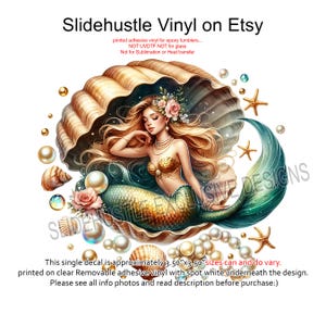 May include: A mermaid with long blonde hair and a green tail sits inside a large seashell. She is wearing a gold seashell bra and a pearl necklace. The seashell is surrounded by white pearls and starfish. The image is a digital illustration and says "Slidehustle Vinyl on Etsy" and "This single decal is approximately 3.50"x3.50" sizes can and do vary. Printed on clear Removable adhesive vinyl with spot white underneath the design. Please see all info photos and read description before purchase."