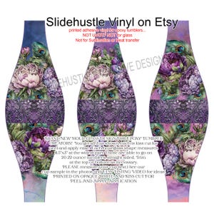 May include: Hourglass-shaped vinyl wrap for epoxy tumblers, featuring a floral and peacock feather design. The wrap measures 8.5" x 3" at its widest point and is kiss-cut for easy peel and application. Text on the wrap reads "Slidehustle Vinyl on Etsy".