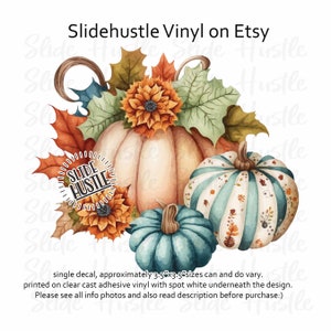 May include: Watercolor-style vinyl decal featuring three pumpkins in shades of peach, teal, and white, surrounded by fall leaves and sunflowers. The decal includes the text "Slide Hustle" and is approximately 3.5" x 3.5".