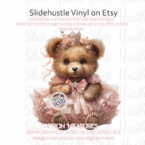 May include: A brown teddy bear wearing a pink dress with a bow and a crown of pink flowers. The bear is holding a sign that says "Slide Hustle". The image is approximately 3.5 inches by 3.5 inches.