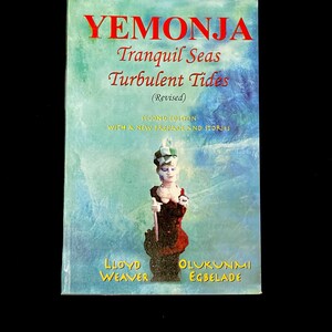 May include: Book cover with a blue and white background. The title is "Yemonja: Tranquil Seas Turbulent Tides (Revised)". The subtitle is "Second Edition with a New Preface and Stories". The author names are "Lloyd Weaver" and "Olukynmi Egbelade".