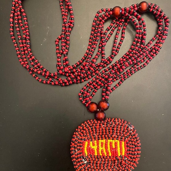 Iyami Eleke in Luxury glass beads Iyami Oshoronga necklace Oshun