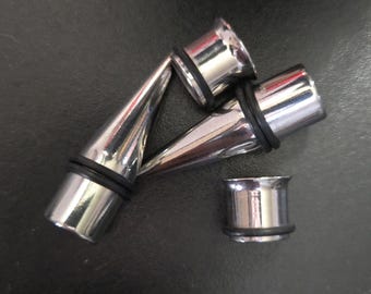 Size 00 plugs, 10mm gauge stainless steel tapers and tunnels set, new in package with black backstops, double zero 00G 10 mm