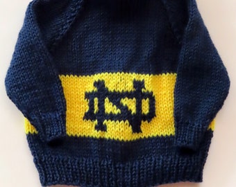 zip-up-the-back / hooded sweater (6 mo. & 9 mo. include matching booties) / Notre Dame University / Notre Dame / Fighting Irish