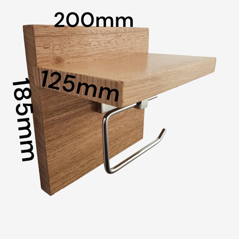 K&ouml;nnte beinhalten: Holzregal mit Toilettenpapierhalter, 12,5 cm breit, 8,5 cm hoch und 20 cm lang.