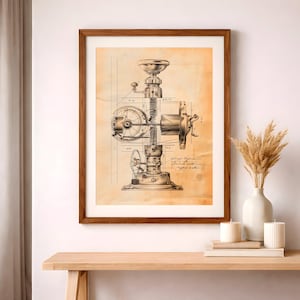 May include: A framed print featuring a detailed mechanical diagram in black ink on aged paper. The diagram depicts a complex machine with gears, levers, and a central screw mechanism. The print is displayed in a brown wooden frame.