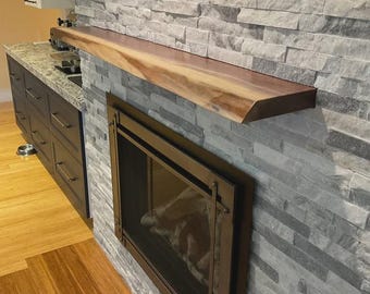 Repisa para chimenea de nogal con borde vivo hecha a medida
