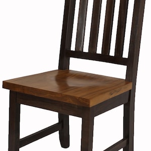 May include: A dark brown wooden chair with a light brown seat and a slatted back.