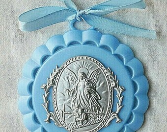 Protection for babies. Little crib medal hand embroidered