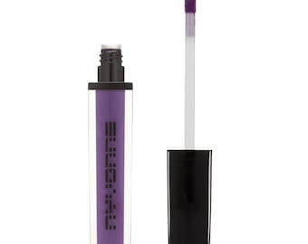 May include: A purple liquid lipstick with a black and clear tube and a black applicator. The brand name "MILK MAKEUP" is printed on the tube.