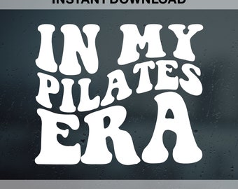 May include: White text on a dark background reads "IN MY PILATES ERA".  The text is in a retro, wavy font.  Below the text, it reads "SVG | PDF | EPS | DXF | PNG".