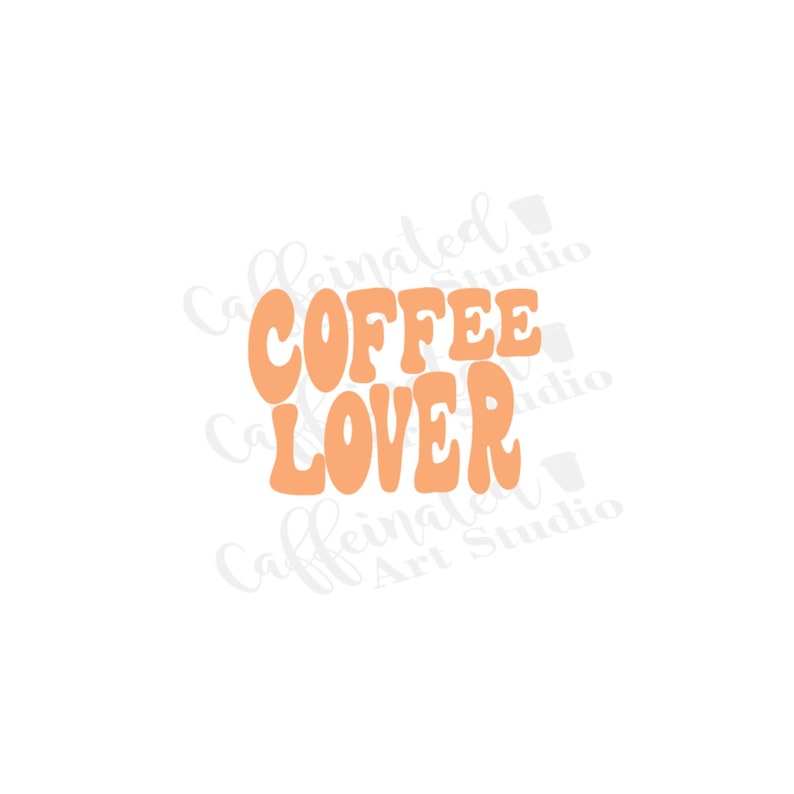 May include: Orange text on a white background reads "COFFEE LOVER" in a retro, bubble font. The design is simple and clean, perfect for coffee enthusiasts.