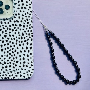 Correa de muñeca con abalorio para teléfono – Auténtica pulsera para teléfono móvil con abalorio de cristal de obsidiana negra - Accesorio de cordón - Se adapta a todas las fundas de teléfono