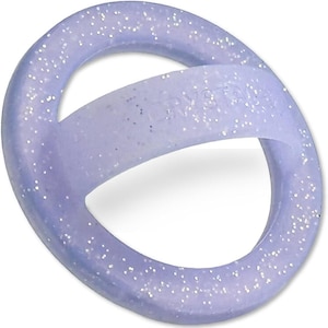 May include: A light purple, glitter-infused ring with a curved band across the center. The band has the word "CRYSTAL" printed on it. The ring is made of a translucent material and is designed to be worn on a finger.