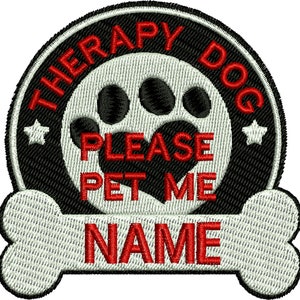May include: Black and white embroidered patch with a paw print and the text "Therapy Dog Please Pet Me NAME" in red. The patch is shaped like a bone.