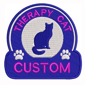May include: Embroidered patch with a blue border and a white circle featuring a blue cat silhouette. The words "THERAPY CAT" and "CUSTOM" are in pink. Two white paw prints are at the bottom.
