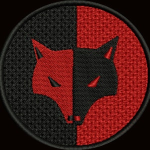 May include: Embroidered patch featuring a stylized wolf head design. The wolf's face is split vertically, with one half in black and the other in red. The patch is circular with a black border.