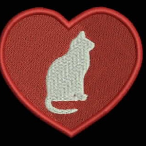 May include: A red heart-shaped patch with a white silhouette of a cat sitting inside.