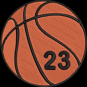 May include: Orange basketball with black stitching and the number 23 printed on it.