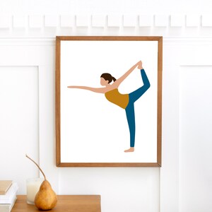 May include: A framed illustration of a person doing a yoga pose. The person is wearing blue pants and a yellow tank top. The background is white.