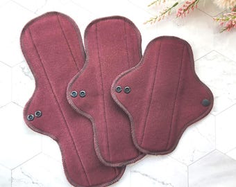 Reusable cloth pads in burgundy cotton pique in various sizes, washable, zero waste menstrual cloth pads