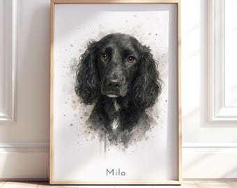 May include: A framed watercolour-style portrait of a black spaniel dog with long, wavy ears and brown eyes. The dog has a small white patch on its chest. Below the dog, the name Milo is printed in a simple, clean, black sans-serif font.
