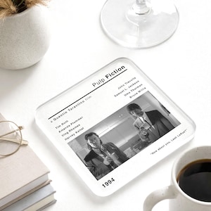 May include: A set of three ceramic mugs with a speckled, matte finish. Each mug features a different color: light blue, cream, and gray. The mugs have a simple, modern design with a rounded shape and a comfortable handle.