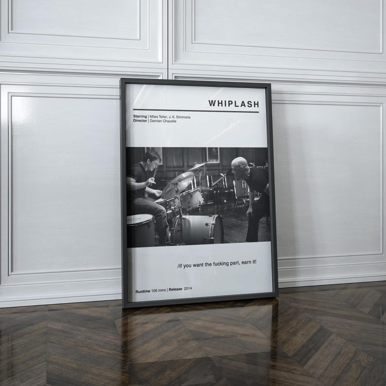 May include: Black and white framed movie poster for the film "Whiplash." The poster features a scene of a drummer and a conductor. Text includes the film title, credits, and the quote "If you want the fucking part, earn it!"