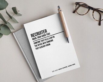 May include: A white notebook with black text defining the word "Recruiter" as someone who fills a gap in the office with someone they already know. The text also includes the phonetic pronunciation of the word and a note to see also "Head Hunter".