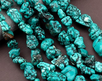 May include: Close-up of turquoise gemstone beads with dark matrix patterns. The beads are irregular in shape and vary in size, displaying a vibrant teal color. These natural stone beads are ideal for jewelry making.
