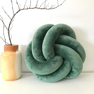 Cute accent pillow for living room, Green Velvet knot pillow, Flat knot cushion in swirl shape