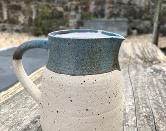 Blue and white stoneware jug.