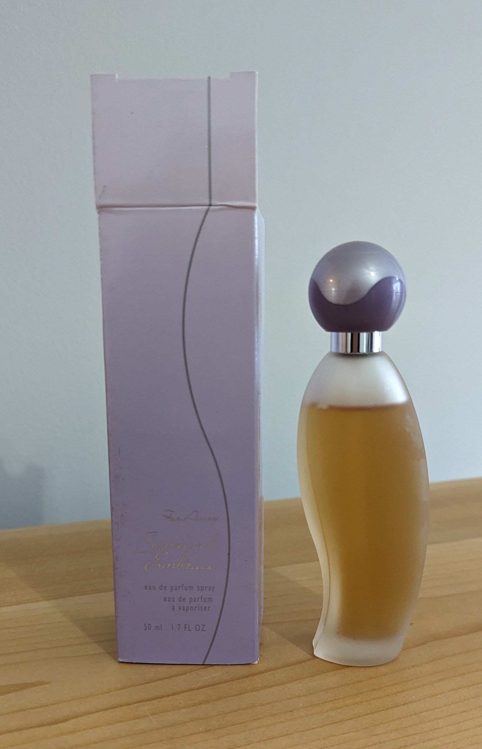 Far away sensual embrace perfume hot sale