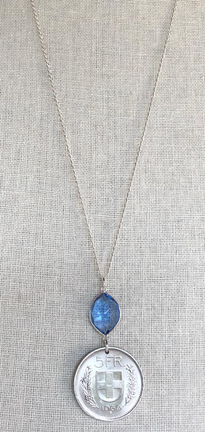 Swiss escutcheon with flower wreaths. Vintage 1968 Switzerland 5 Franc Coin with Tanzanite on 26\u201d Sterling Silver Necklace