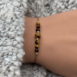 Tigerögaarmband, runt eller fasetterat • Kraftarmband • Modarmband • Inre styrka • Lyckobringare • Personlig ädelstensgåva
