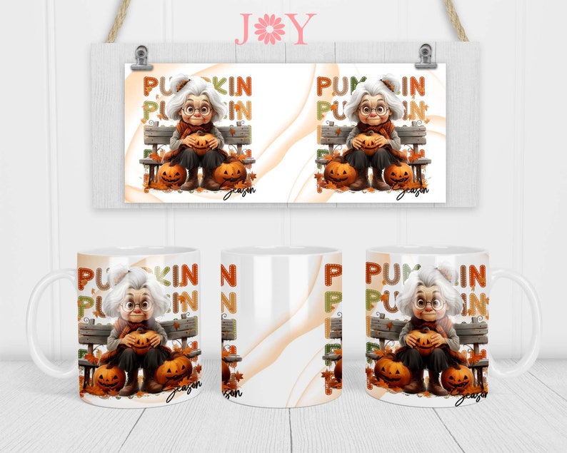 Op de afbeelding: Twee witte keramische mokken met een kleurrijk ontwerp met een cartoonvrouw die een pompoen vasthoudt. De mokken hebben de tekst "Pumpkin Season" erop.